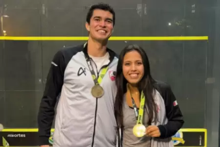 Diego Elas y Luciana Castillo con la medalla de oro.
