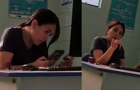 Doctora usa celular mientras atiende.