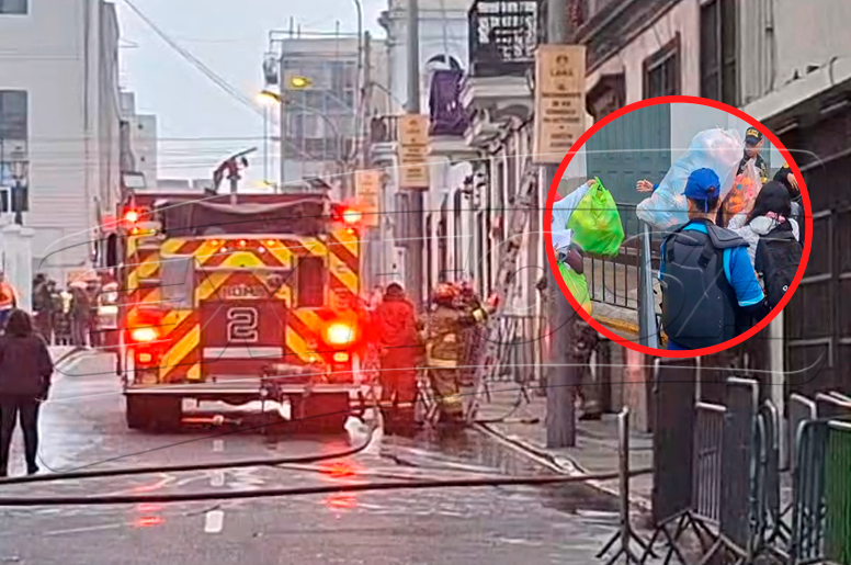 Bomberos tratan de controlar el fuego y comerciantes buscan salvar su mercadería.