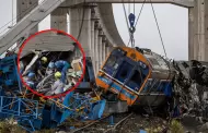 Tragedia ferroviaria: Gr�a cae sobre tren dejando al menos 31 muertos y decenas de heridos