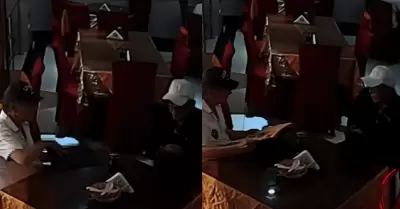 Pareja de adultos mayores ingresan a chifa para robar un celular y mil soles