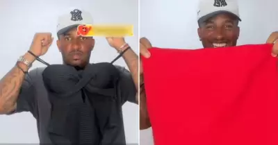 Jefferson Farf�n se luce ayudando a vender ropa