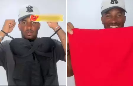 Jefferson Farf�n se luce ayudando a vender ropa