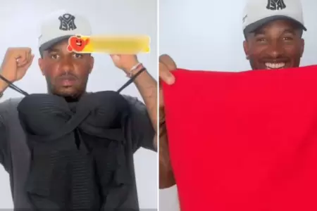 Jefferson Farf�n se luce ayudando a vender ropa