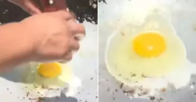 Vecina de VMT fr�e un huevo en plena calle