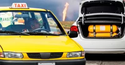 Conductores hacen largas colas en estaciones de servicio tras la reducci�n del s