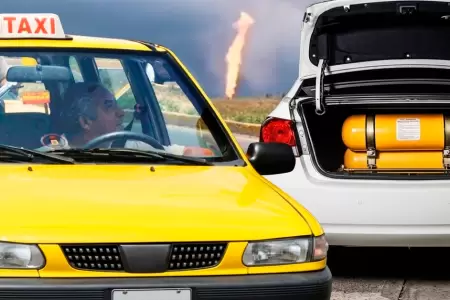 Conductores hacen largas colas en estaciones de servicio tras la reducci�n del s