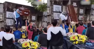 Ata�d se cae en pleno sepelio