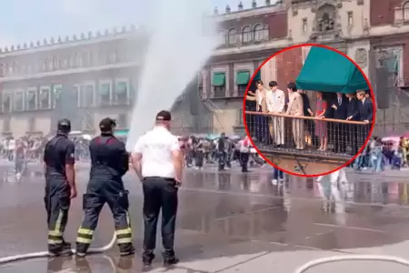 Bomberos tuvieron que aliviar el calor de las fans durante la espera de la boyba