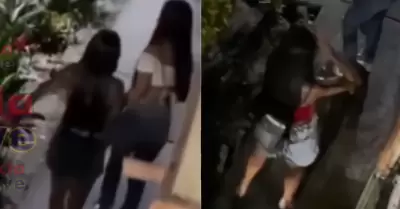 Vecina arroja agua a j�venes que quer�an orinar en su puerta