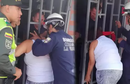 Vecina atrapada en rejas por mirar si su vecina estaba en casa.