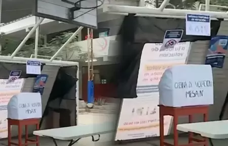 Mesa de votaci�n instalada en arco de cancha de f�tbol.