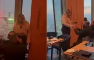 Hombre sorprende al pedir la mano su novia con mensaje en helic�ptero en el edificio m�s alto de la ciudad