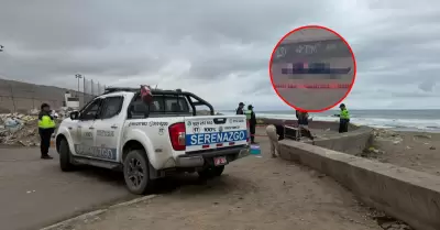 V�ctima espera a ser identificada en la morgue de Lima.