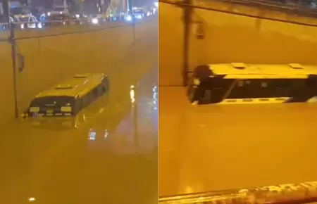 Bus queda atrapado en �valo Nueva Esperanza tras intensa lluvia