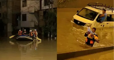 Personal de la Polici�a rescata a personas de inundaciones en VES y VMT