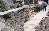 Pobladores de Chosica cruzan puente sostenido con palos y rocas: temen efectos de fenómeno El Niño