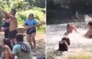Mujer encuentra a su esposo nadando con su amante en un río y protagoniza inesperada escena